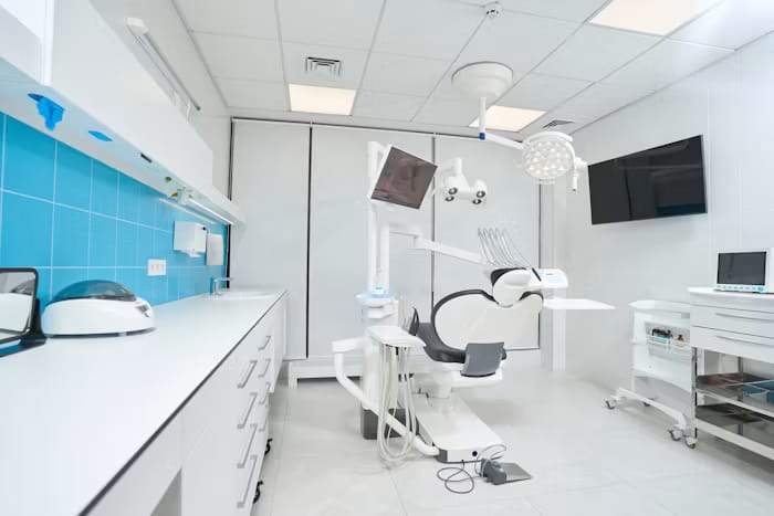 Dentist consulting a patient at Brothers Dental, Brahmanbaria